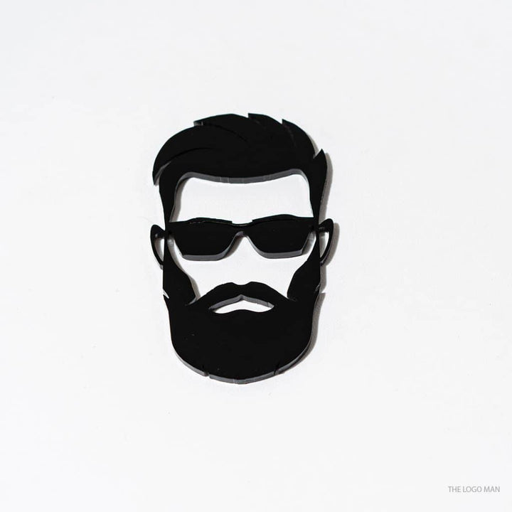 Black and white illustration of a man with a beard and sunglasses on a light gray background