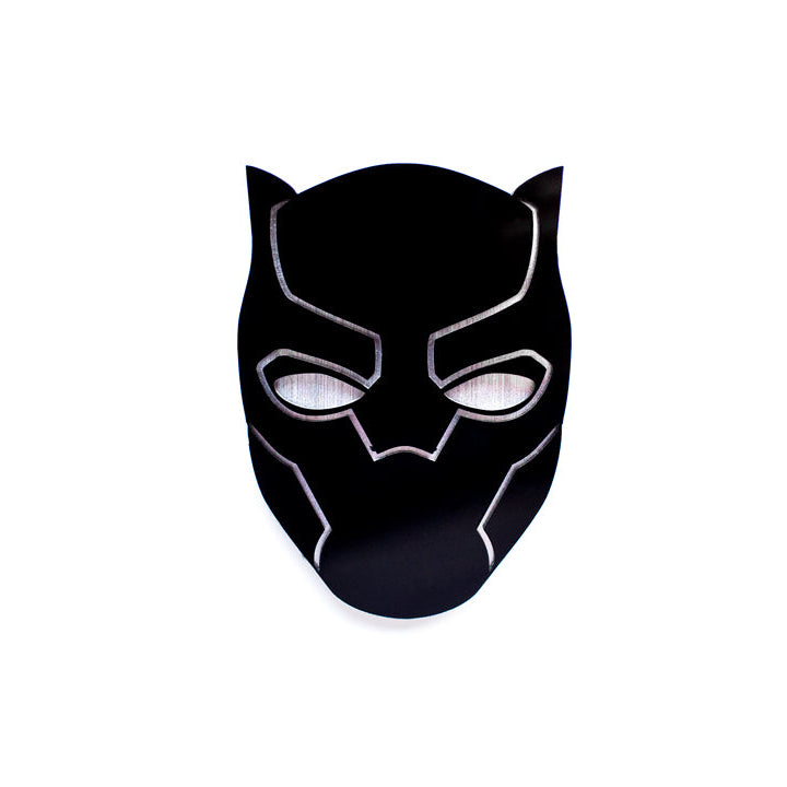 Black mask with white eyes on a white background