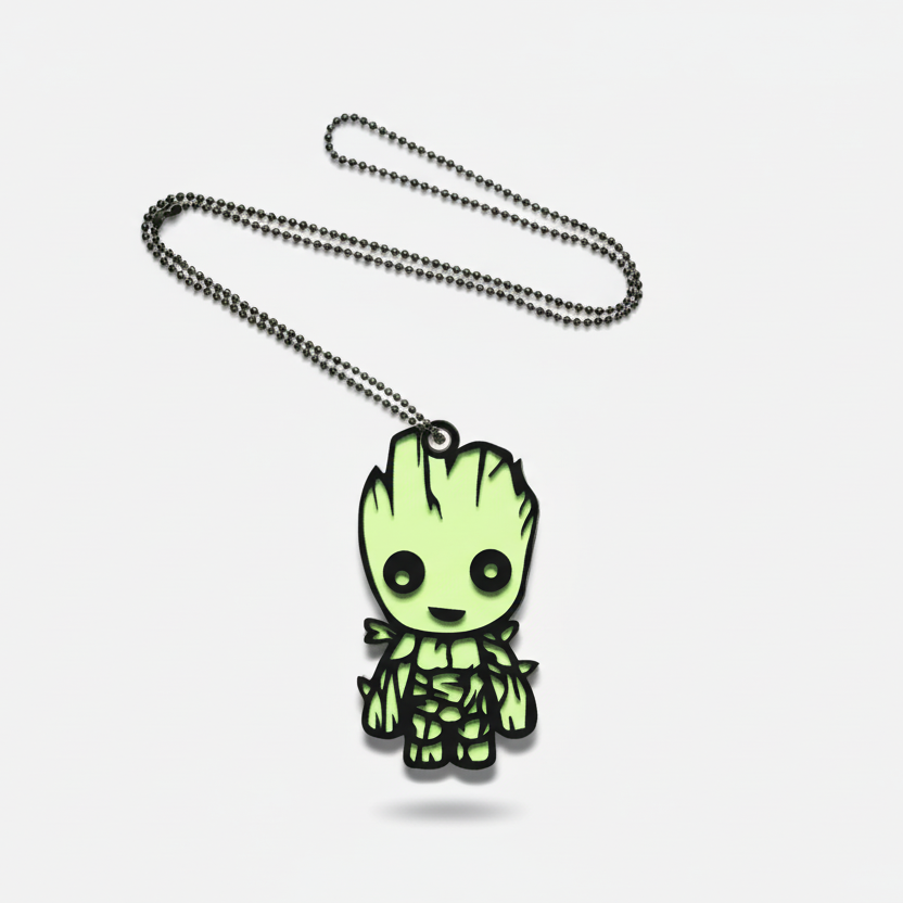 Glowing green character pendant on a chain against a white background