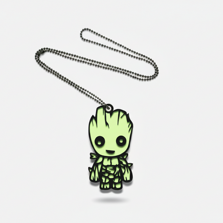 Glowing green character pendant on a chain against a white background