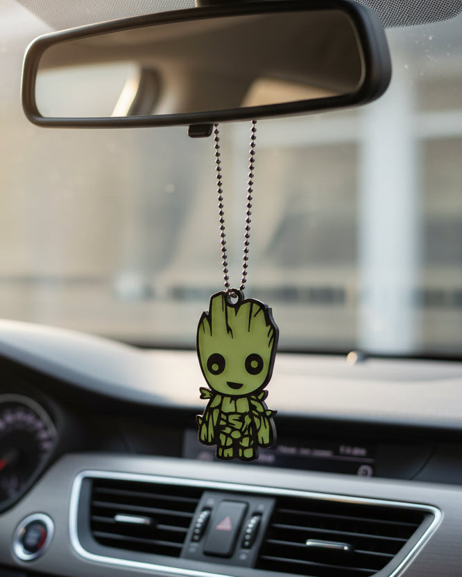 Glowing green character pendant on a chain against a white background