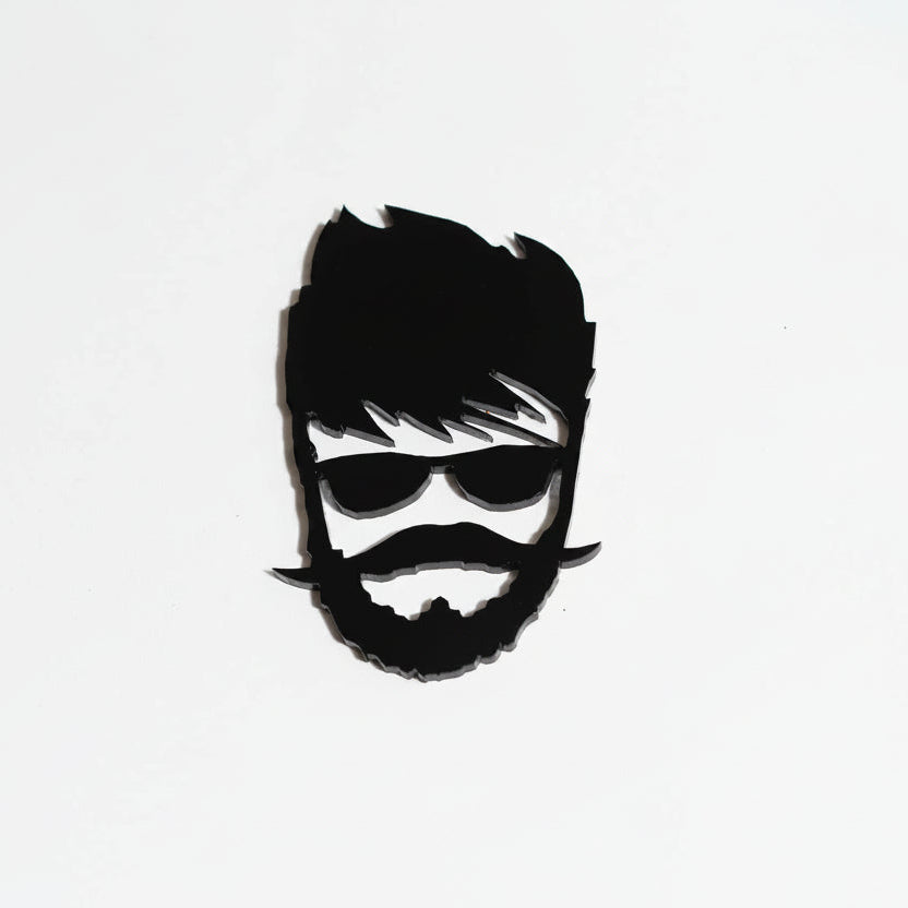 Black silhouette of a man with sunglasses and a beard on a white background