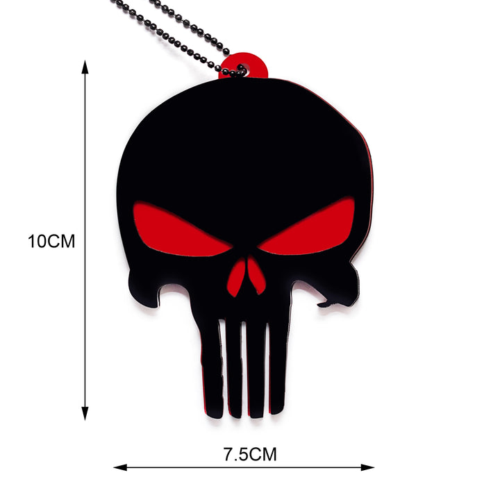 Black and red skull pendant with measurements on a white background