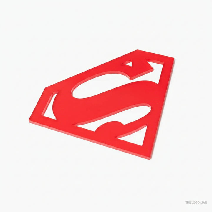 Red Superman logo on a white background